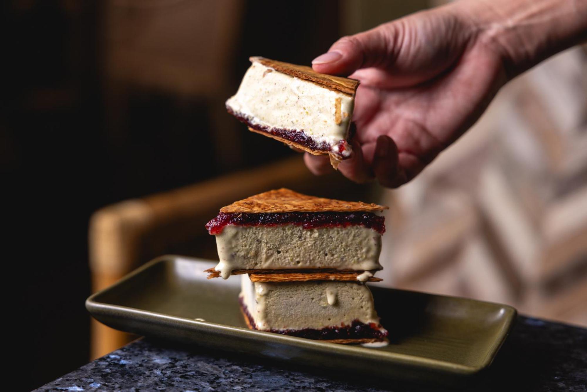Ovolo The Valley Brisbane Zewnętrze zdjęcie A hand holding a piece of ice cream sandwich